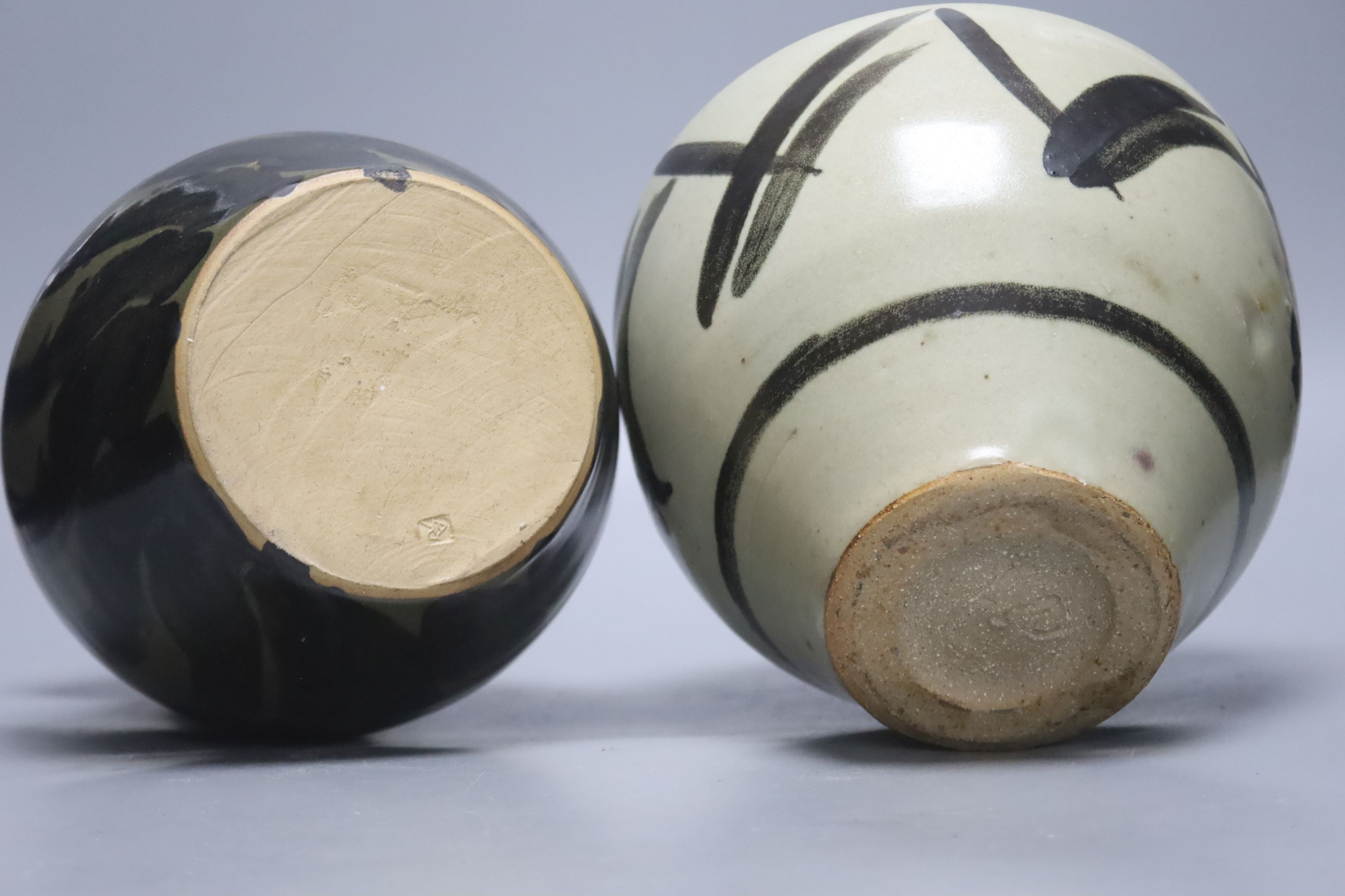 Andrew Rudebeck. A pottery jar and cover, 22cm and three Studio pottery vases